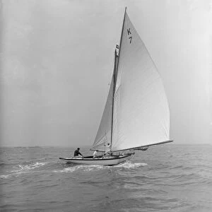 The 7 Metre Ginerva (K7) under sail, 1912. Creator: Kirk & Sons of Cowes