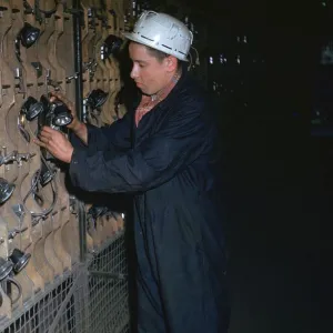 Coal miner collecting his lamp