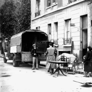 Delivery of furniture confiscated from Jews to victims of RAF bombing, Paris, April 1942