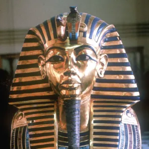 Gold mask of Tutankhamun on his mummy-case