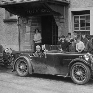 Kitty Brunell in her MG Magna outside the Stag Hotel, Edinburgh, RSAC Scottish Rally, 1932