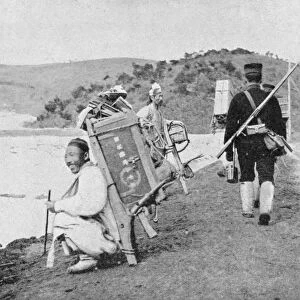 Korean coolies acting as porters for Japanese soldiers, Russo-Japanese War, 1904-5