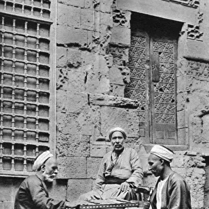 Men relaxing, Cairo, Egypt, c1922. Artist: Donald McLeish