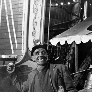 Miner at a fairground, Conisbrough, near Doncaster, South Yorkshire, 1955. Artist