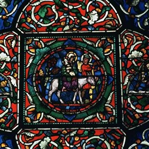 Stained glass depiction of the holy family fleeing to Egypt, 12th century