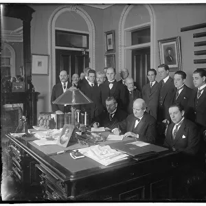 William Jennings Bryan with group at desk, between 1910 and 1920. Creator: Harris & Ewing. William Jennings Bryan with group at desk, between 1910 and 1920. Creator: Harris & Ewing