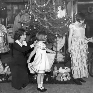 Christmas 1934 Print: Young Girls in Party Dresses at Barkers Store Christmas 1934 Print: Young Girls in Party Dresses at Barkers Store