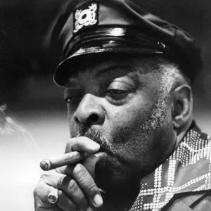 Count Basie Print - A photograph of Count Basie smoking a cigar Count Basie Print - A photograph of Count Basie smoking a cigar