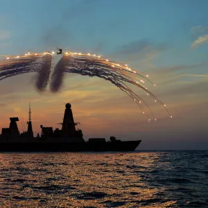 HMS Dragons Lynx Helicopter Firing Flares