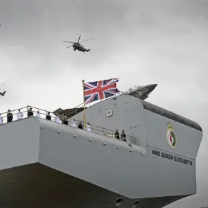 The Queen Christens Royal NavyaS New Aircraft Carrier