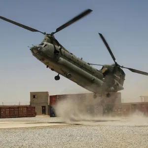 An RAF Chinook helicopter making the tricky approach to the Helicopter Landing Site