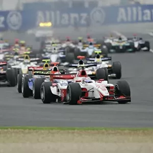 2007 GP2 Series. Round 4. Magny-Cours, France. 1st July. Sunday Race Nicolas Lapierre (FRA, DAMS) leads the field into turn one. Action. World Copyright: Andrew Ferraro/GP2 Series Media Service. ref: Digital Image_F6E2930