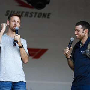 2018 British GP: SILVERSTONE, UNITED KINGDOM - JULY 05: Guy Martin talks to Jenson Button on stage during the British GP at Silverstone on July 05