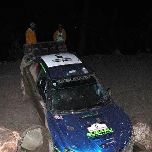 FIA World Rally Championship: The Subaru Impreza of Petter Solberg after it was thrown off the track by a rock on Stage 15