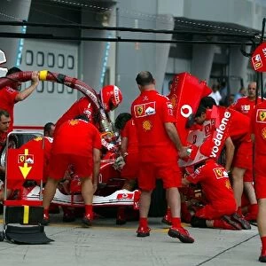 Formula One World Championship: The Ferrari team practice pit stops