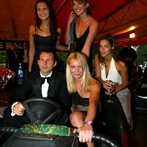 Formula One World Championship: Manchester Utd football star Ryan Giggs on dodgems with friends at the Drivers Ball held at Stowe School