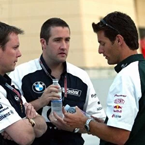Formula One World Championship: Sam Michael Williams Chief Operations Engineer chats with Mark Webber Jaguar
