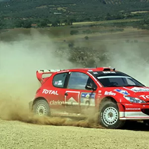 Richard Burns in action in the Peugeot 206 WRC, Acropolis Rally 2003. Photo: McKlein/LAT