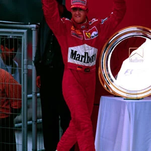 Schumacher salutes the crowd