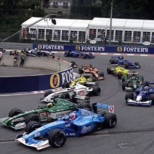 Spa Francorchamps, Belgium. 2nd Spetember 2001: Jenson Button, Benetton Renault B201, and Pedro De La Rosa, Jaguar R2, battle for position at