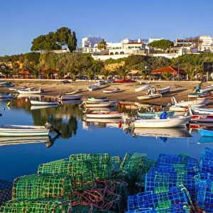 Colorful fishing traps and motorboats along the beach, Elvas, Alentejo Region, Portugal