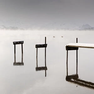 Early morning mist on Ullswater in the English Lake District on a cold winter morning