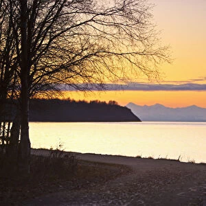 Scenic View Of Cook Inlet Along The Tony Knowles Coastal Trail At Sunset, Anchorage, Southcentral Alaska