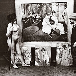 Toulouse-Lautrec and naked model in his studio standing in front of his 1893 painting Au Salon de la rue des Moulins. Henri Marie Raymond Toulouse-Lautrec, aka Henri de Toulouse-Lautrec, 1864-1901. French Post-Impressionist artist, printmaker, draughtsman, caricaturist, and illustrator. Photograph by Maurice Guibert, 1856-1913
