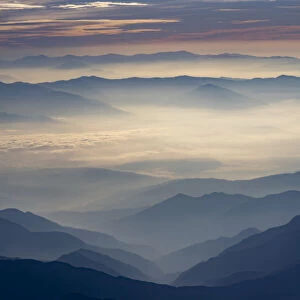 View of the Himalayan foothills at dawn, from Kathmandu to Everest flight over Himalayas, Nepal