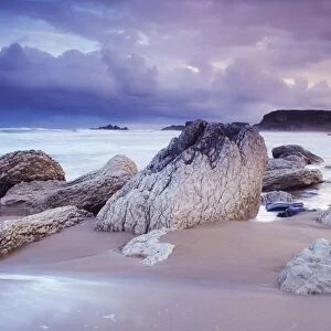 Whitepark Bay, Co Antrim, Ireland; Rocks On The Beach During A Storm