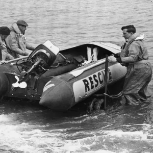 A 16ft rubber inshore rescue craft belonging to the Mumbles lifeboat team begins its