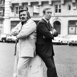 Actor Michael Caine poses with Tony Mascia in Hanover Square during a break in filming