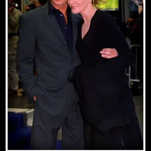 Actor Pierce Brosnan August 1999 with actress Rene Russo at the premiere of the film