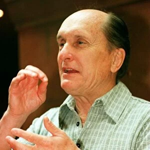 Actor Robert Duvall in Glasgow May 1998 pretending to drink cup of tea