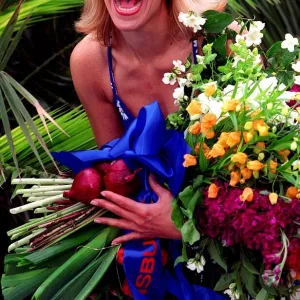 Actress Miranda Burrows at Chelsea flower show May 1997 holding boquet of flowers