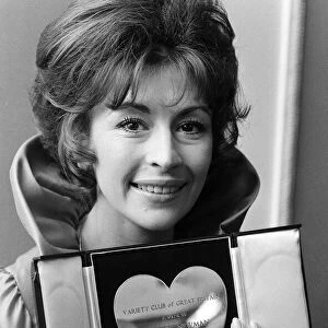 Actress Nanette Newman with her award for Variety Club of Great Britain film actress of