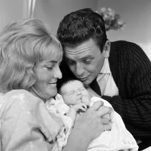 Actress Sheila Hancock and actor Alec Ross with their newborn baby Melanie at Queen