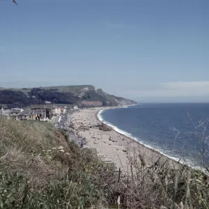 Aerial view showing the beach at the small seaside town of Seaton on the South Devon