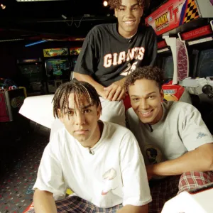 American boy band 3T playing video games at an Arcade 9th September 1996