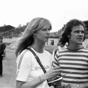 Barry Sheene and his girlfriend Stephanie McLean talking to James Hunt at a practice day