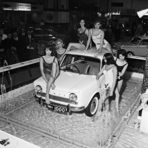 Bathing beauties with the new Simca 1000 in display fountains at the Earls Court Motor
