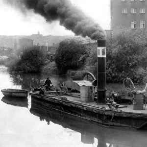 the BD6, a steam operated dredger built in 1843, at work in the 1950s