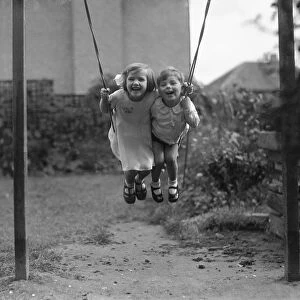 Betty Graves and Keith having fun on a back garden swing Alfieri. 1277