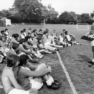 Birmingham City players listen to instructions from manager Jim Smith during a pre season