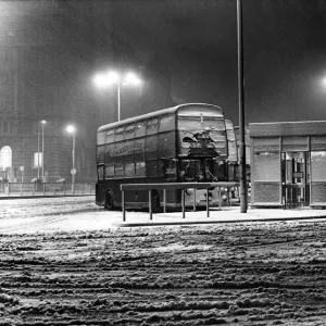 The bleak scene at the Pier Head as the snow gets a grip. Liverpool, Merseyside