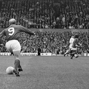 Bobby Charlton, in the number 9 shirt for Manchester United, at Old Trafford