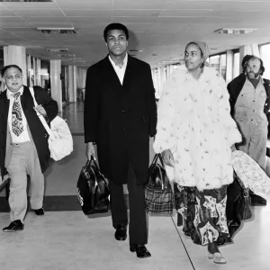 Boxer Muhammad Ali and wife Belinda at Heathrow Airport en route to Beruit from New York