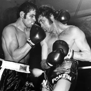 Boxing, punishing moment as Chris Finnegan (right) corners Eddie Avoth