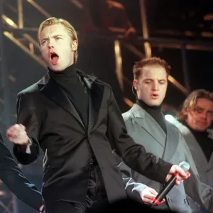 Boyzone Pop group December 1999 Ronan Keating (centre) singing with Stephen Gateley