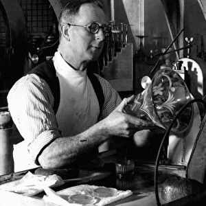 Brierley Hill Glassworks 1st April 1952 Ernie Rowley engraving a vase in the works